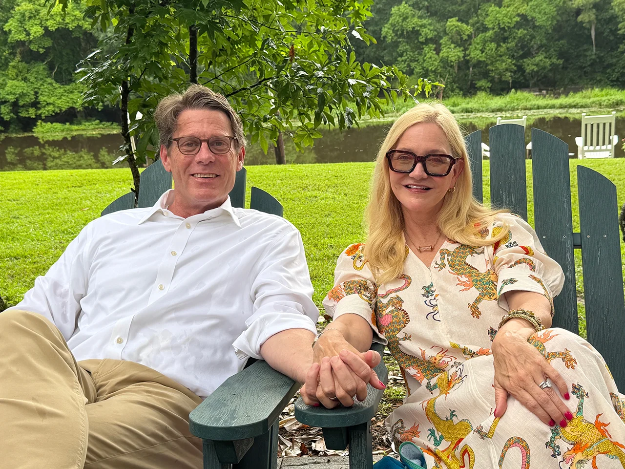 Cameron Mary and his wife sitting in the backyard